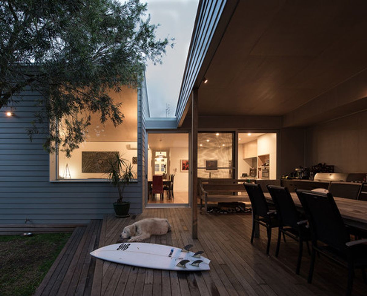 Built R3 A Roofed Deck Provides Functional Outdoor Living Space