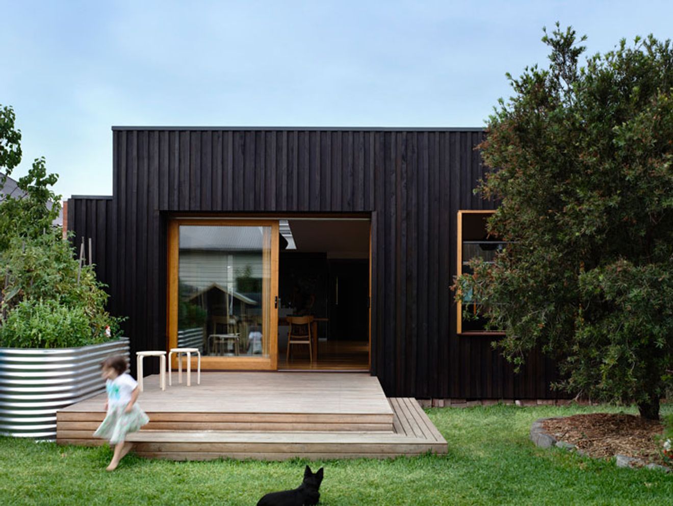 Batten and Board House: A Simple 'Box' Transforms a Weatherboard