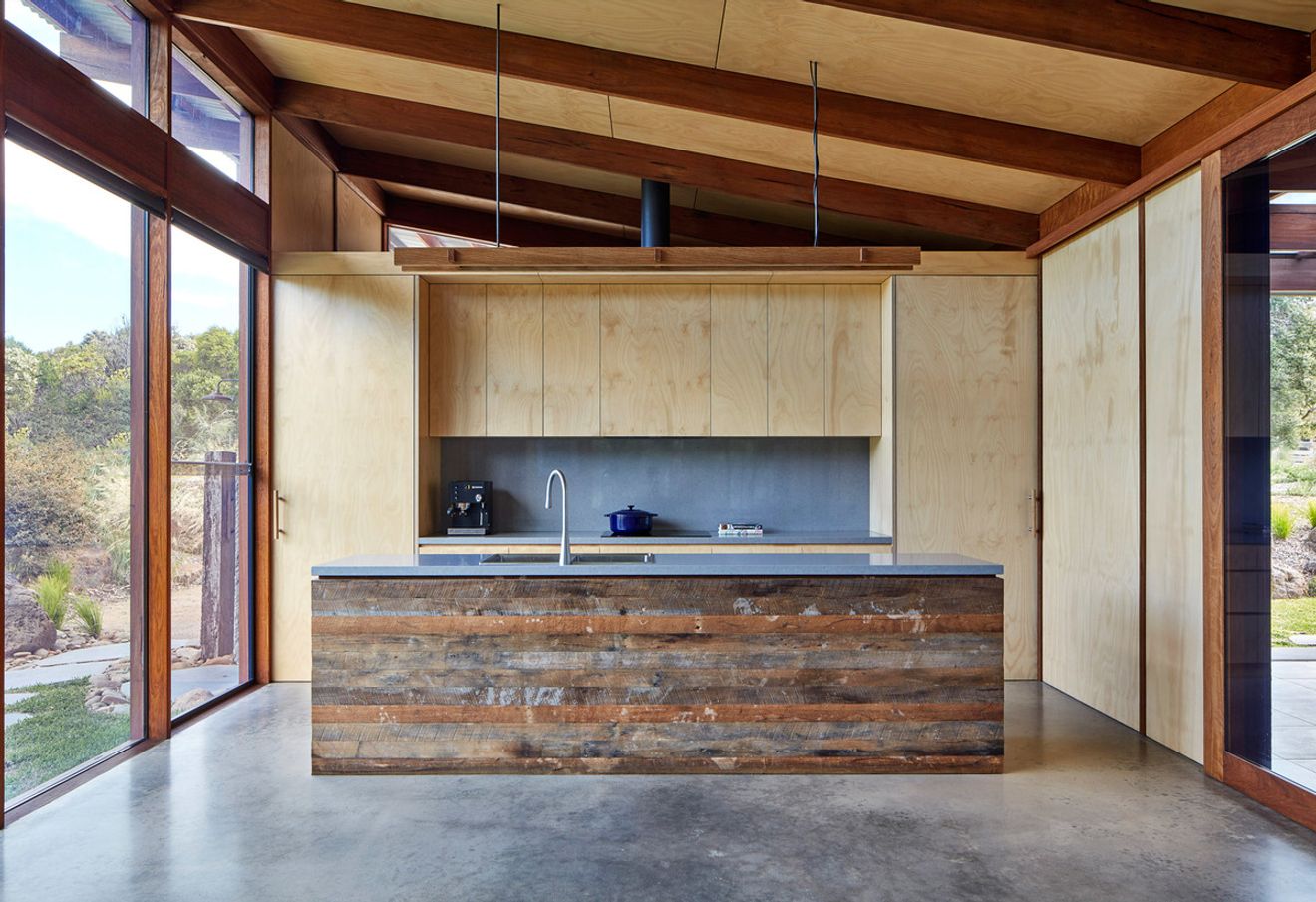 A Courtyard Connects Living and Sleeping Areas at this Beach House