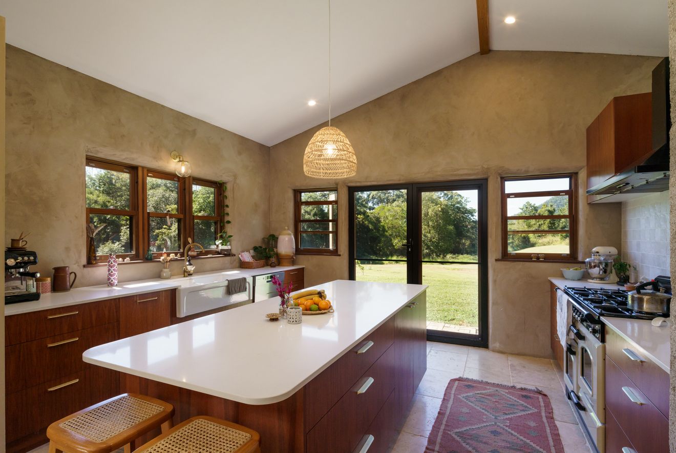 Curated visual reference: Humidity Regulating Features In Modern Homes With Large Windows Reference: Discover Mark And Megan S Off Grid Hempcrete Home On