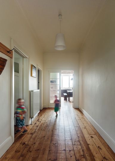 Amy's House has a generous hallway leading the reconfigured living space at the rear