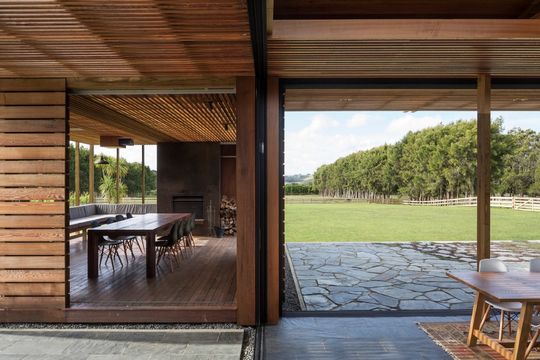 This Home Is Grounded Into Its Site by Walls of Gabion Baskets