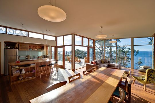 Bruny Shore House dining area and kitchen take in the stunning views