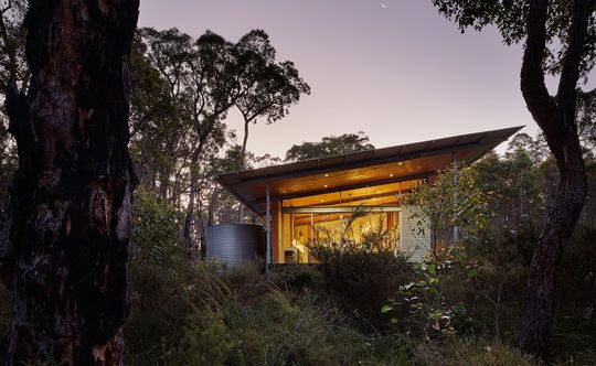 A Home Inspired by the Feelings of Camping Under a Simple Tarpaulin