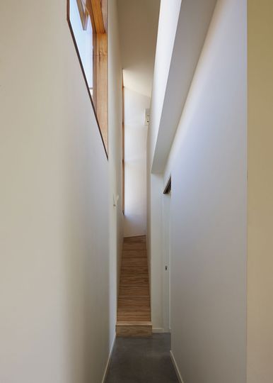 Engawa House narrow stair leads to mezzanine office