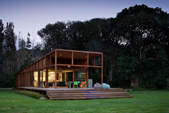 Great Barrier House's Skeletal Timber Frame Allows it to Open Up