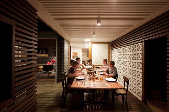 Haberfield House timber batten alfresco dining area with concrete breeze block wall