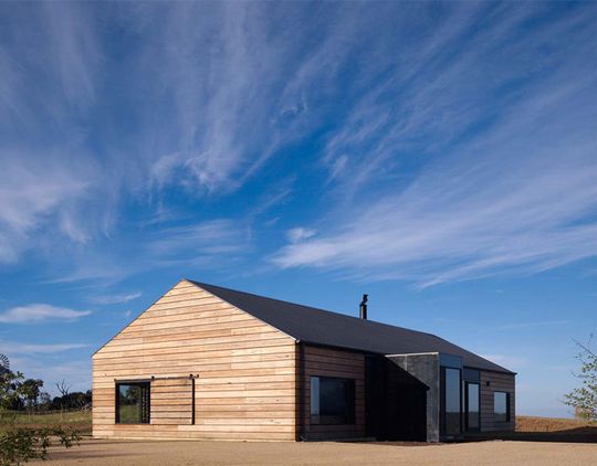 Hill Plain House is inspired by Victorian-era agricultural buildings