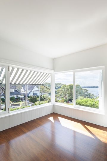 Sun pours into the house from the sun room which also has stunning views of Sydney Harbor