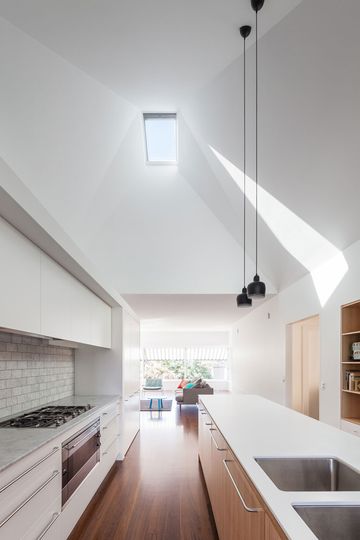 A sculpted ceiling is highlighted by a single north facing skylight which lets light deep into House Chapple