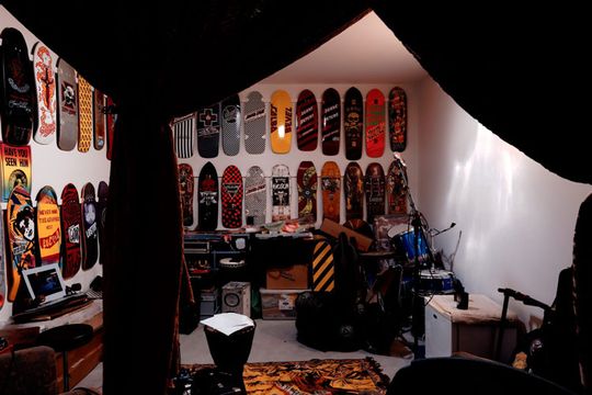 Islington House studio is filled with skateboards and musical equipment