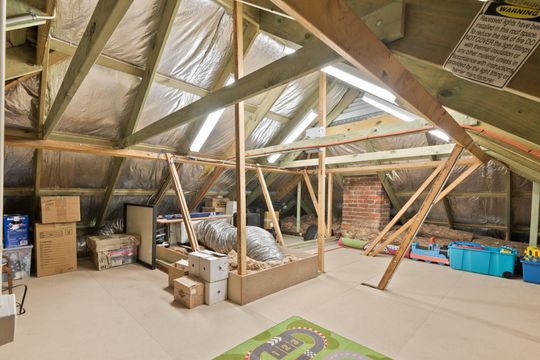 A Unique Vaulted Ceiling and Clerestory Windows Bring in the Light