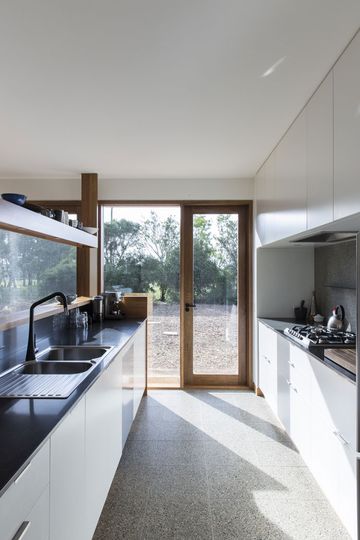 Leura Lane House kitchen with natural sunlight and terrazzo tiles