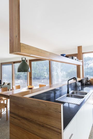 Leura Lane House kitchen overlooking the living and dining areas