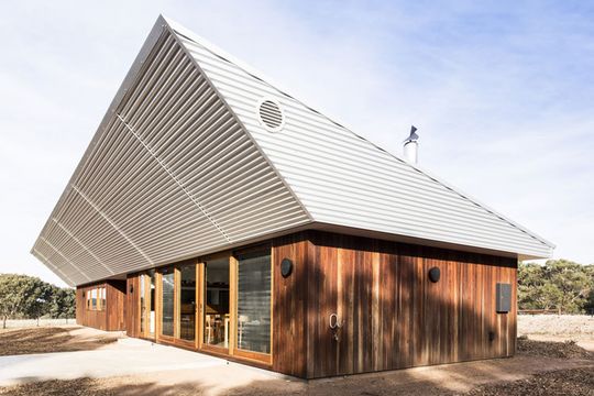 Leura Lane House has a bank of North-facing windows and an angled awning to protect the home from summer sun