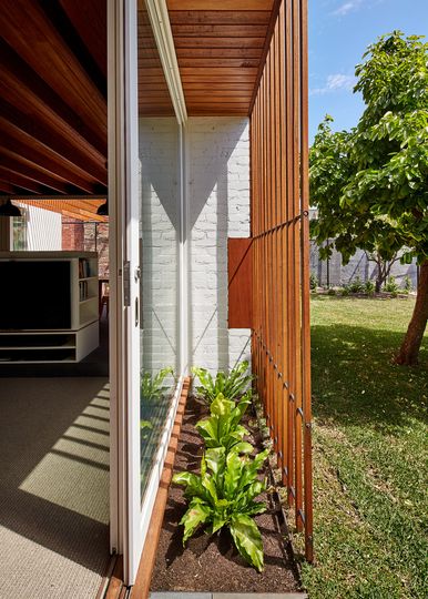 Rich Materials and Light-Filled Courtyards Connect Old to New