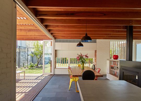 Rich Materials and Light-Filled Courtyards Connect Old to New