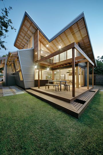 A Cozy, Nest-Like Mezzanine Studio Floats Above This Living Space