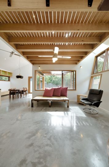 A Cozy, Nest-Like Mezzanine Studio Floats Above This Living Space