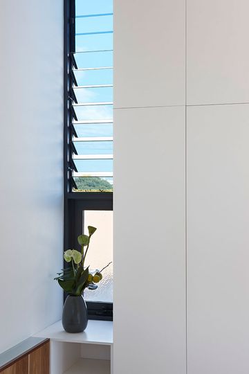 North Fitzroy House has louvre windows which help with ventilation, creating a stack effect in the double height space