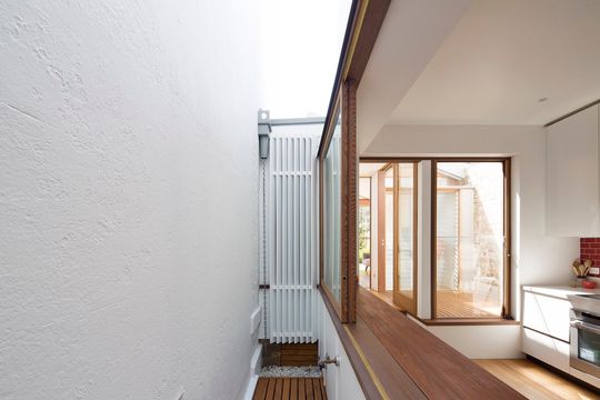 Back-of-House Renovation Makes This Courtyard House an All-Seasons Home