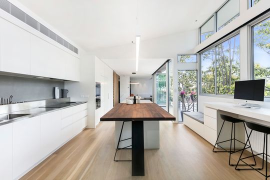 Former Milkbar Now a Light-filled Family Home Among the Treetops