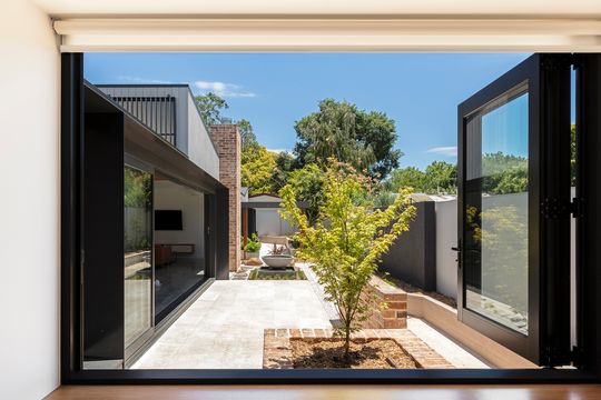 North Facing Living Spaces Provide Space and Light to This Home