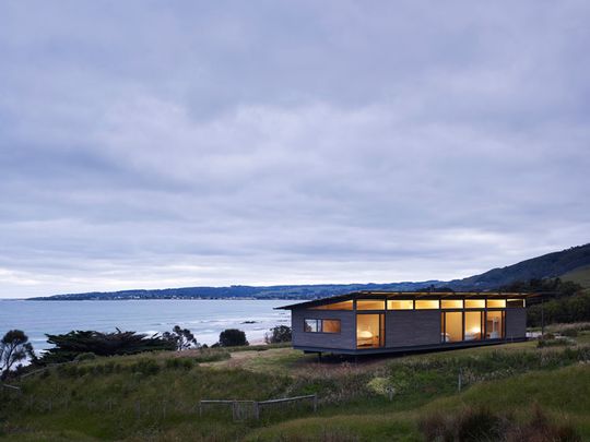 Sugar Gum House sits where the foothills of the Otways meets the surf and glows as the sun sets