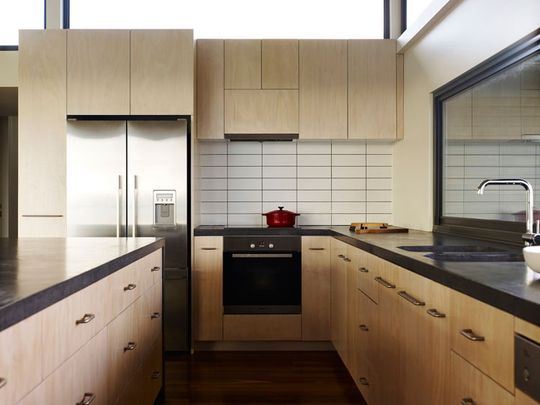 Limed Hoop Pine Plywood is used for the Kitchen Joinery at Sugar Gum House