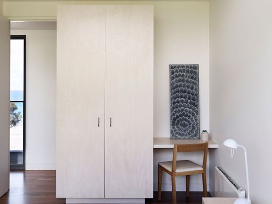 Wardrobe and desk in a bedroom of Sugar Gum House