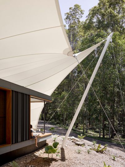 A Unique Family Home Covered Entirely By a Tent Structure