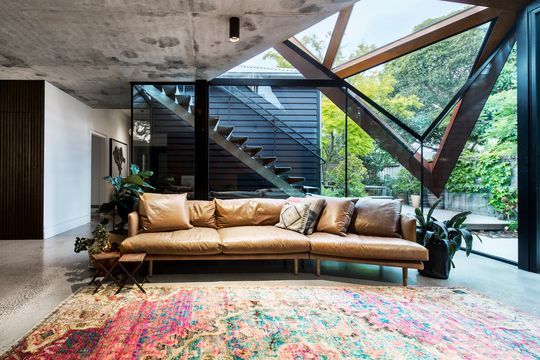 Glazed Roof Floats Like a Leaf Capturing Views of Trees and Sky