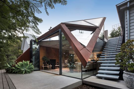 Glazed Roof Floats Like a Leaf Capturing Views of Trees and Sky