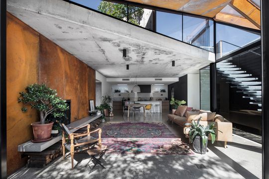 Glazed Roof Floats Like a Leaf Capturing Views of Trees and Sky