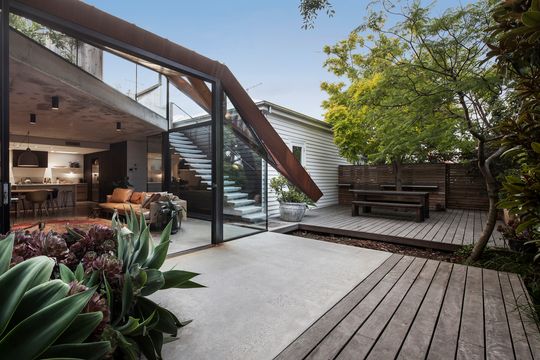 Glazed Roof Floats Like a Leaf Capturing Views of Trees and Sky