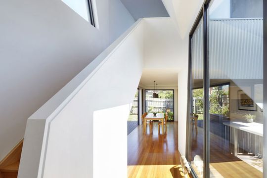 Yarra Street House corridor between old and new house with stair to upstairs lounge