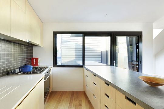 Yarra Street House with plywood kitchen and concrete bench-top