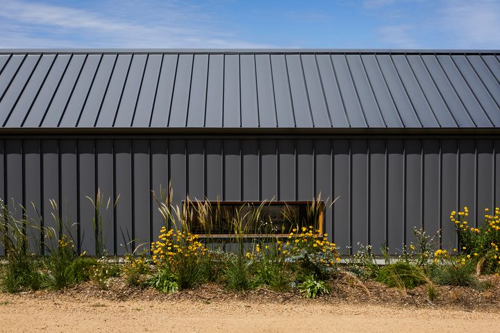 Charred Timber Creates a New BAL-12.5 Wing for This Country Home